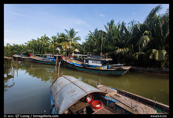 River channel and boats near Cam Kim Village. Hoi An, Vietnam (color)