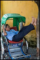 Cyclo driver relaxing. Hoi An, Vietnam (color)
