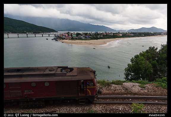 Train, bay, and village. Vietnam