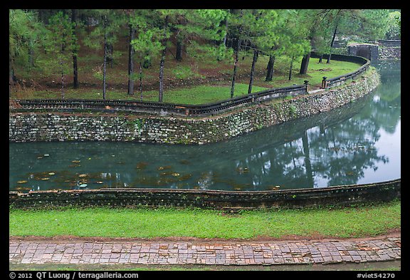 Walkway, Luu Khiem Lake arm, and stone fence, Tu Duc Tomb. Hue, Vietnam