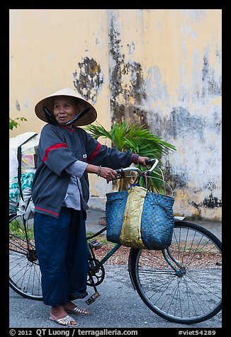 Elderly woman with bicycle, Thanh Toan. Hue, Vietnam