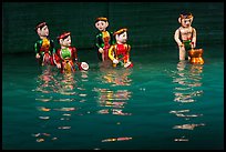Water puppets (5 characters with musical instruments), Thang Long Theatre. Hanoi, Vietnam ( color)