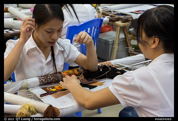 Women in silk embroidery factory. Vietnam