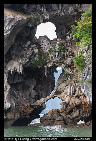 Openings through rocks. Halong Bay, Vietnam