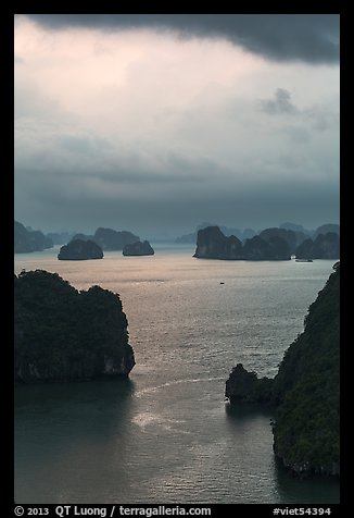 Seascape with limestone islets from above, evening. Halong Bay, Vietnam