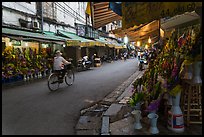 Street with flower sellers in early morning, old quarter. Hanoi, Vietnam ( color)
