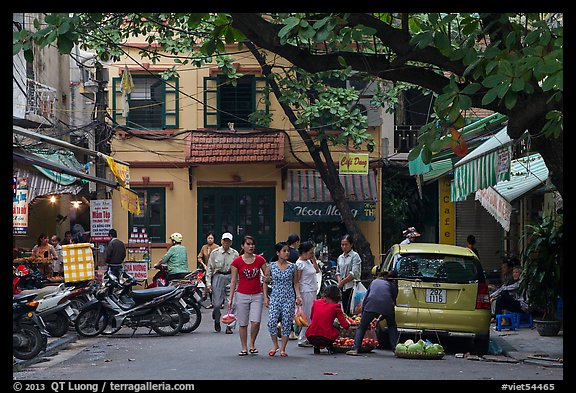 Early morning food shopping, old quarter. Hanoi, Vietnam (color)