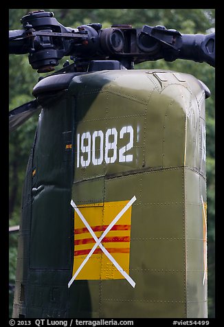 Helicopter tail with crossed-out flag of South Vietnam, Hanoi Citadel. Hanoi, Vietnam