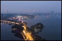 West Lake and city skyline from above by night. Hanoi, Vietnam (color)