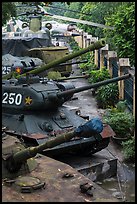 Tanks, helicopters, and warplanes, military museum. Hanoi, Vietnam ( color)