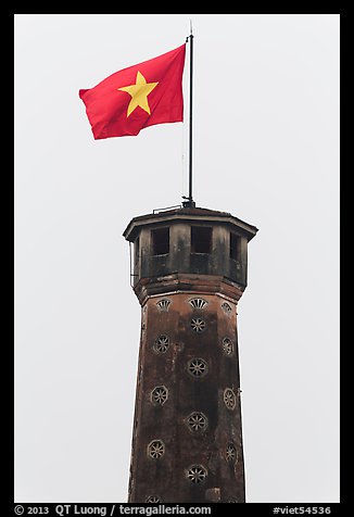 Vietnamese flag flying over flag tower, Hanoi Citadel. Hanoi, Vietnam (color)