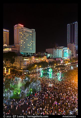 Packed Nguyen Hue boulevard on Christmas eve from above. Ho Chi Minh City, Vietnam (color)