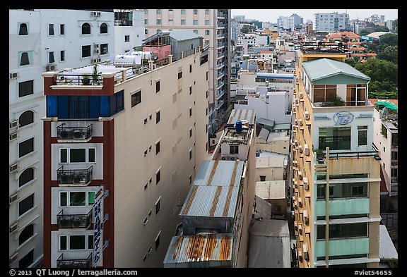 Rooftop view of skinny hotel buildings. Ho Chi Minh City, Vietnam (color)