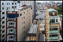 Rooftop view of skinny hotel buildings. Ho Chi Minh City, Vietnam ( color)