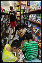Children reading in bookstore. Ho Chi Minh City, Vietnam ( color)