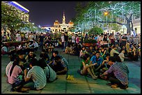 Groups in front of City Hall on New Year eve. Ho Chi Minh City, Vietnam (color)