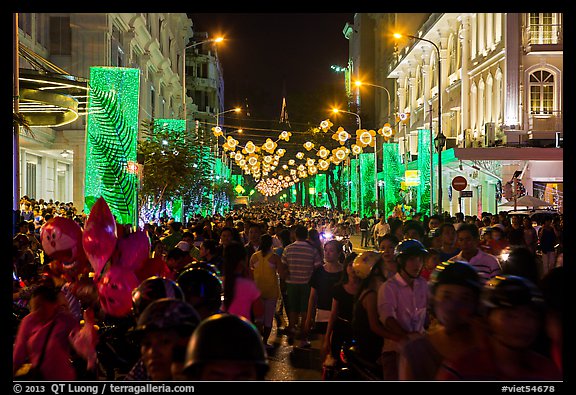 Packed street at night, New Year eve. Ho Chi Minh City, Vietnam