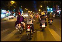 Motorbike riders at night from riders perspective. Ho Chi Minh City, Vietnam (color)