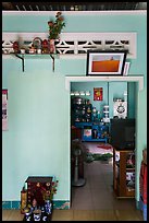 House interior with altars and picture. Mui Ne, Vietnam ( color)