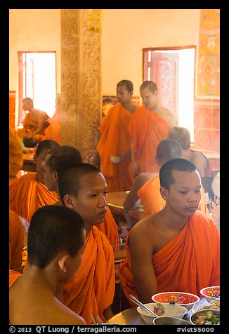 Theravada monks in dining room, Hang Pagoda. Tra Vinh, Vietnam