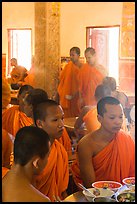 Theravada monks in dining room, Hang Pagoda. Tra Vinh, Vietnam (color)