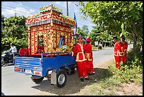 Funeral vehicle and attendants. Tra Vinh, Vietnam (color)
