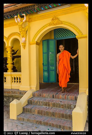 Monk standing in entrance, Ang Pagoda. Tra Vinh, Vietnam