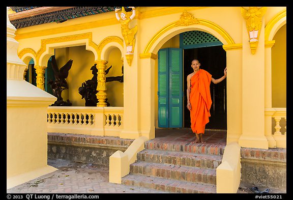 Monk standing in front of Ang Pagoda. Tra Vinh, Vietnam