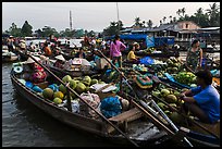 Boats closely decked together, Phung Diem floating market. Can Tho, Vietnam (color)