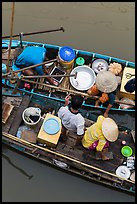 Couples on two side-by-side boats seen from above. Can Tho, Vietnam (color)
