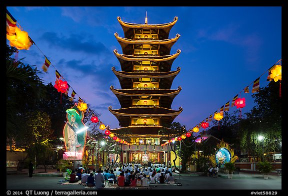 Evening worship at Viet Nam Quoc Tu pagoda. Ho Chi Minh City, Vietnam (color)