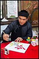 Caligrapher in traditional costume. Ho Chi Minh City, Vietnam ( color)