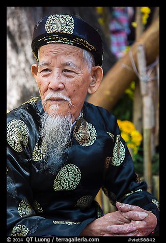 Elder in traditional costume. Ho Chi Minh City, Vietnam (color)
