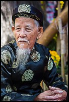 Elder in traditional costume. Ho Chi Minh City, Vietnam ( color)