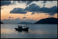 Fishing boat and Con Son Bay, sunrise. Con Dao Islands, Vietnam ( color)