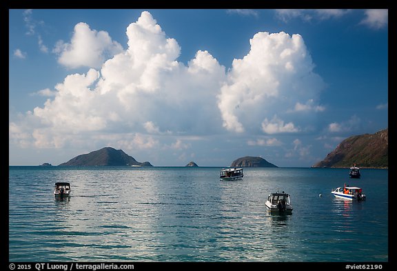 Boats, islets, and clouds, Con Son Bay. Con Dao Islands, Vietnam
