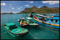 Fishing boats and Ba Island, Ben Dam. Con Dao Islands, Vietnam ( color)