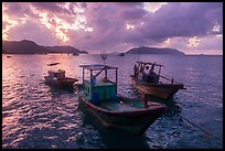 Fishing boats at sunrise, Con Son harbor. Con Dao Islands, Vietnam ( color)