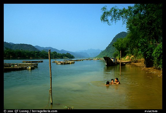 River with kids playing, Son Trach. Vietnam (color)
