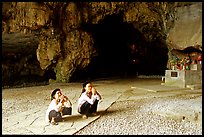 Elderly women praying in Nhi Thanh Cave. Lang Son, Northest Vietnam (color)
