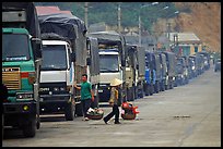Trucks waiting to cross the border into China at Dong Dang. Lang Son, Northest Vietnam (color)