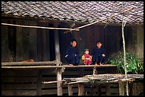 Women and child of the Nung ethnicity in front of their home. Northeast Vietnam (color)