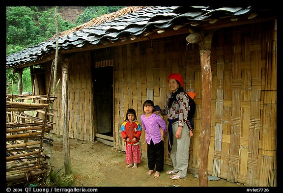 Family outside their home. Northeast Vietnam