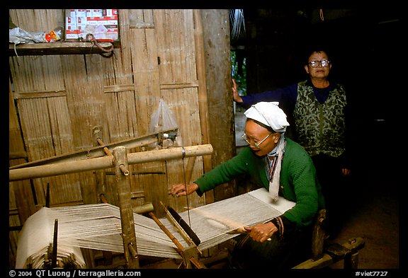Elderly woman weaving in her home. Northeast Vietnam