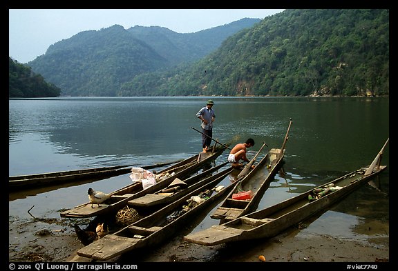 Dugout boats on the shore of Ba Be Lake. Northeast Vietnam