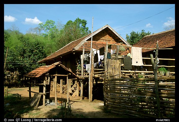 Woman drying laundry in a montagnard village near Son La. Northwest Vietnam
