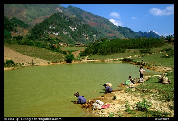 Thai women on the shores of a pond, near Tuan Giao. Northwest Vietnam