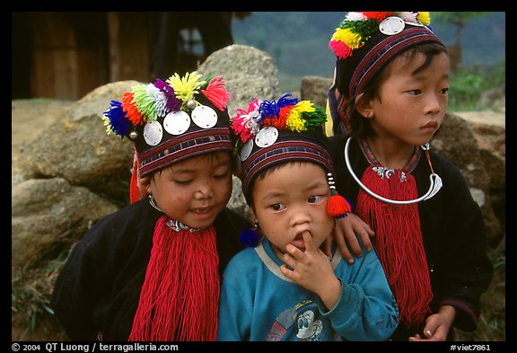 Black Dzao children wearing the hat with three coins, between Tam Duong and Sapa. Northwest Vietnam (color)