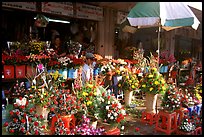 Flowers for sale outside the Ben Than Market. Ho Chi Minh City, Vietnam (color)