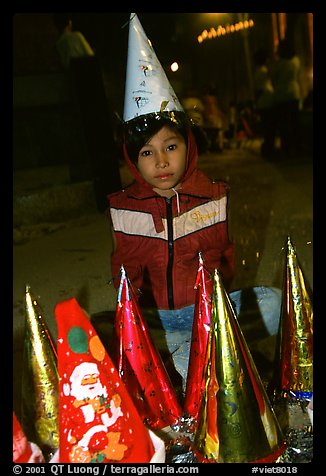 Child on Christmas night. Ho Chi Minh City, Vietnam